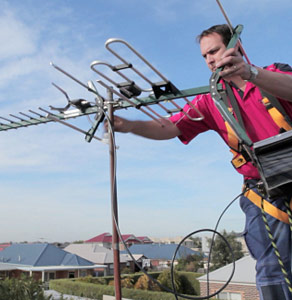 engineer installing FreeView TV aerial